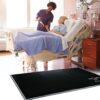 SBEV-1W Bedside Safety Floor Mat for elderly fall injury prevention. Hospital Nurse With Digital Tablet Talks To Senior Patient